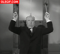 GIF: Alfred Hitchcock haciendo bíceps con una guillotina