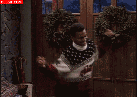 GIF: Carlton bailando con un jersey navideño