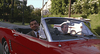 GIF: Mr. Bean regalando peinetas